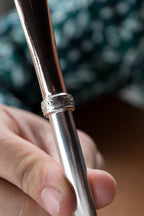 Bombilla de plata y oro
